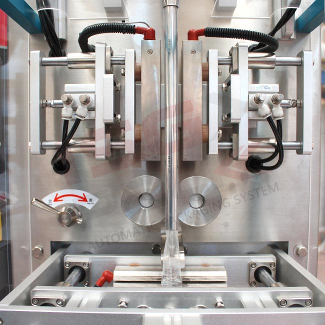 2 - CONFEZIONAMENTO-MACCHINA-VERTICALE